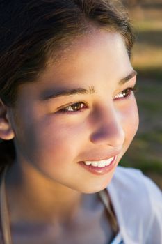 Portrait of a young beautiful smiling girl