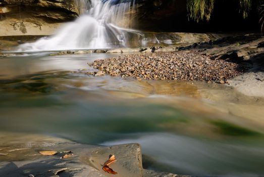 It is a beautiful waterfall from the river.