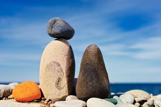 Some of different color pebble on the sea coast