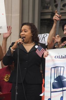 OKLAHOMA CITY, OK - SEPTEMBER 13, 2009: Protesters march to the Oklahoma capitol building to demonstrate their support for health care reform on September 13, 2009 in Oklahoma City, Oklahoma.