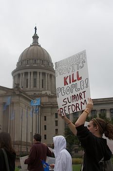 OKLAHOMA CITY, OK - SEPTEMBER 13, 2009: Protesters march to the Oklahoma capitol building to demonstrate their support for health care reform on September 13, 2009 in Oklahoma City, Oklahoma.