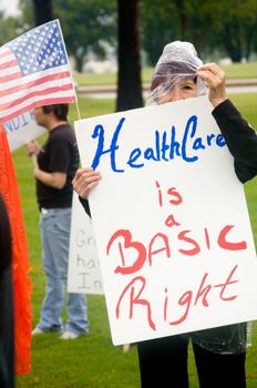 OKLAHOMA CITY, OK - SEPTEMBER 13, 2009: Protesters march to the Oklahoma capitol building to demonstrate their support for health care reform on September 13, 2009 in Oklahoma City, Oklahoma.