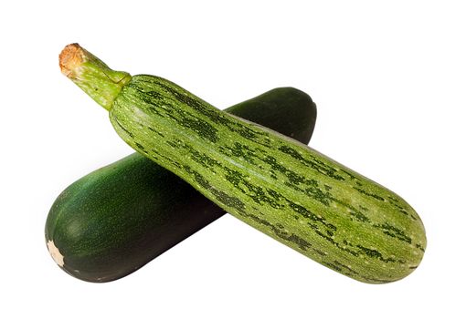 We see two green marrows isolated on the white background