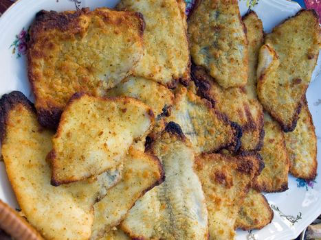 Fresh tasty roasted fried Flounder Plaice flat fish on a plate 