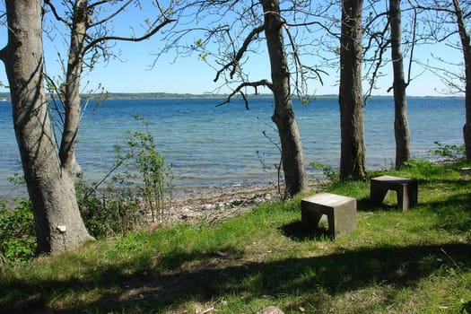Beautiful seascape from seats made of stone on shore 