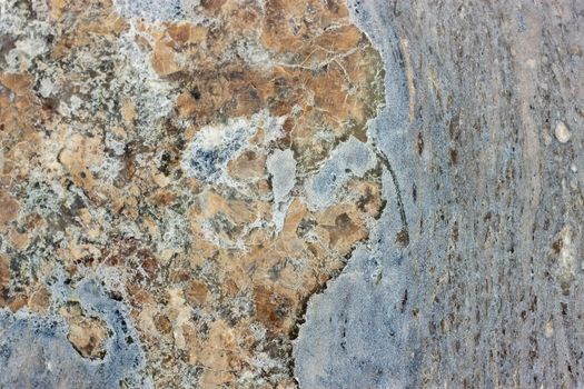 We see Gray, blue and red granite Texture