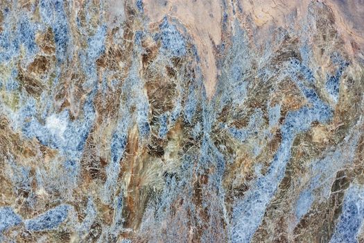 We see Gray, blue and red granite Texture