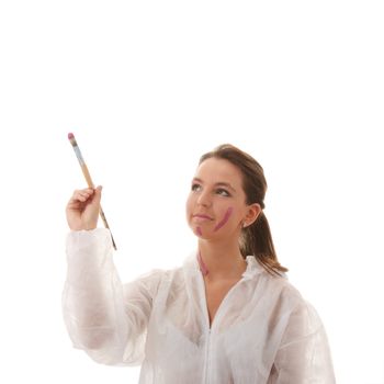 Beautiful female artist with a violet brush - isolated over white