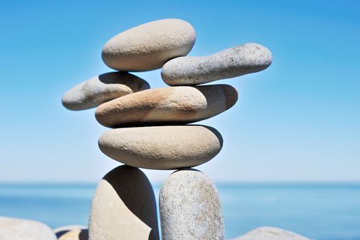 Sculpture of long white gravel on the sea coast