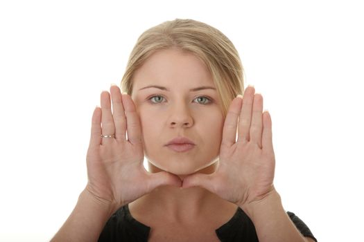 Young woman frame her face with palms