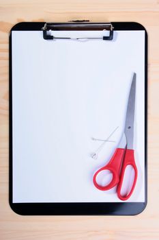 Writing scissors and pins on Blank Clipboard.