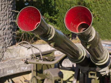 Vintage military anti aircraft gun in closeup view
