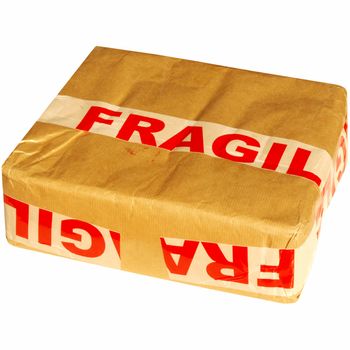 Fragile corrugated cardboard packet isolated on white