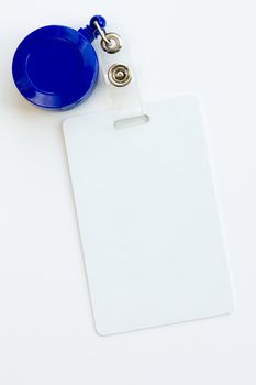 Blank ID card or badge isolated against white background