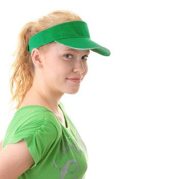 Young beautiful blond woman with green cap isolated on white background