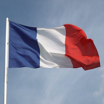 Flag of France over a blue sky