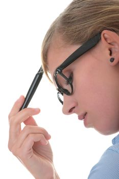 Portrait of a thoughtful young woman in blue shirt holding pen (secretary, student or young buisness woman)