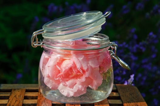 Homemade rose perfume with roses from the garden