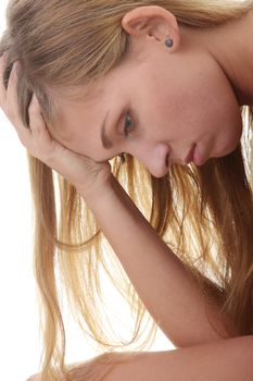 Beautiful young woman depressed - isolated on white background