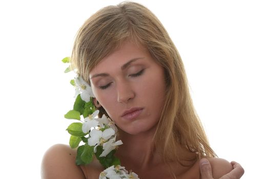 Beautiful blond woman with small white apple tree flowers isolated on white background