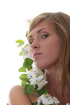 Beautiful blond woman with small white apple tree flowers isolated on white background
