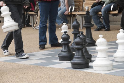 People playing outdoor chess