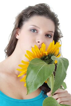 Portrait of a Beautiful girl with sunflower, studio shot over white