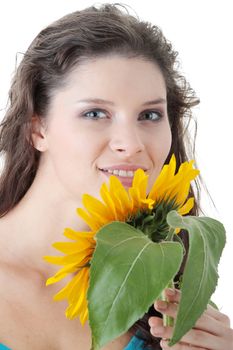 Portrait of a Beautiful girl with sunflower, studio shot over white