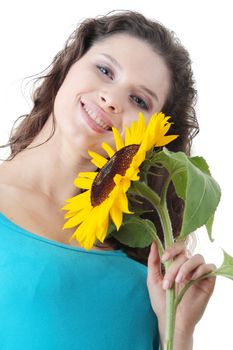 Portrait of a Beautiful girl with sunflower, studio shot over white