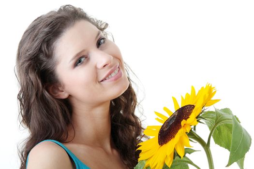 Portrait of a Beautiful girl with sunflower, studio shot over white