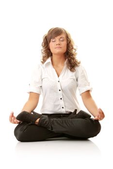 Businesswomen meditating in lotus position isolated on white