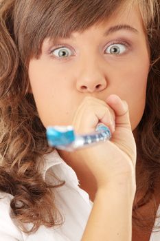 Young woman in business siut wearing party favors