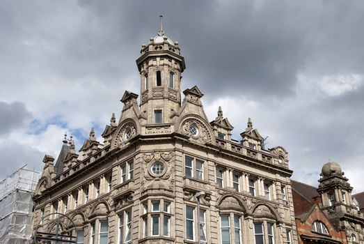 An ornately decorated nineteenth century bank building in an english city