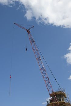 A Red Tower Crane on a newbuild construction site