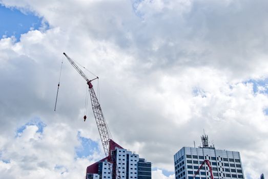 Red Tower Crane and Twin Apartment Blocks