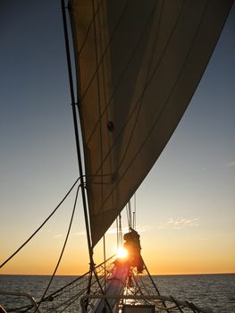 Sunset, ship on sea