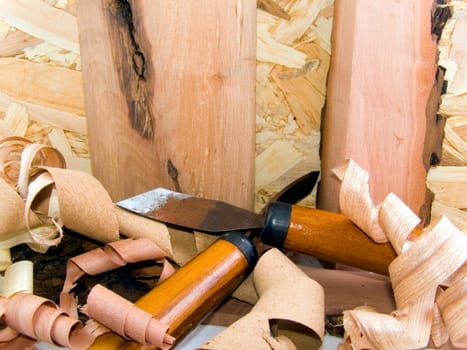 tools for wood cutting on a peaces of wood