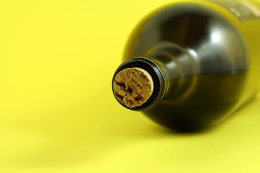 Wine bottle with yellow background