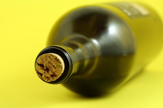 Wine bottle with yellow background