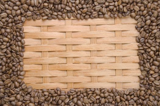 Coffee in grains on a background of a tree.