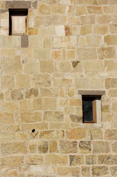 image of the detail of a stone wall of a monastery