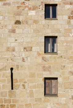 image of the detail of a stone wall of a monastery