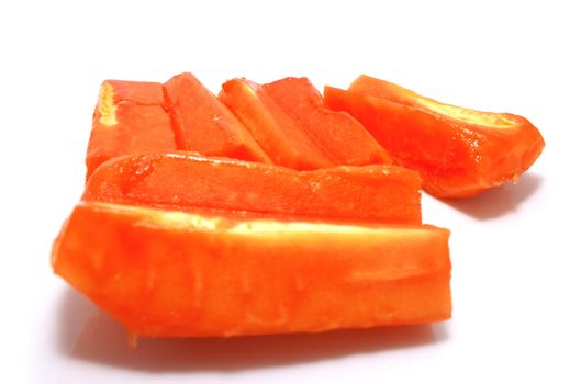 Cutted papaya fruits on white background with sharow.