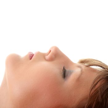 Close-up portrait of beautiful caucasian woman with closed eyes on white