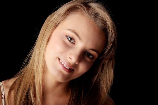 Young beautiful woman portrait isolated on black background