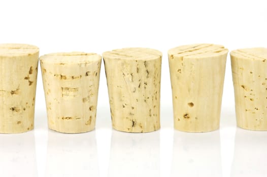 Cork stopper isolated against a white background