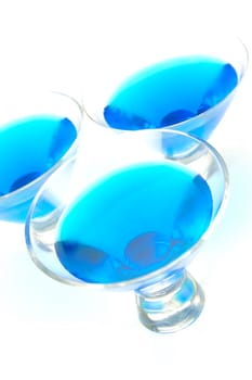 Cosmopolitan cocktails isolated against a white background