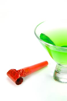 Cosmopolitan cocktails and party favours isolated against a white background