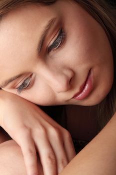 Young beautiful woman portrait isolated on black background