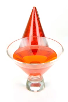 Cosmopolitan cocktails and party favours isolated against a white background